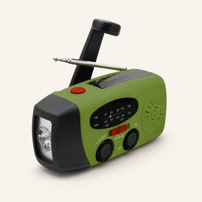 Green emergency weather radio with hand crank, solar panel and flashlight