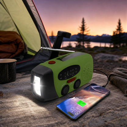 Green emergency weather radio with hand crank, solar panel and flashlight